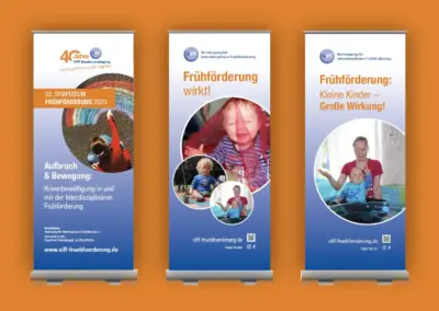 3 verschiedene Roll-Up-Banner für 40 Jahre VIFF-Bundesvereinigung auf orangefarbenem Hintergrund.